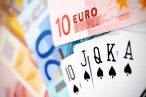 Cards and a magnifier on money.