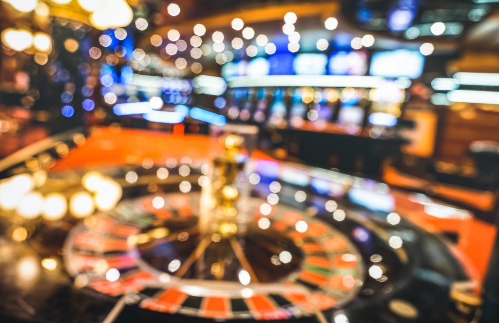 Blurred defocused background of roulette at casino saloon