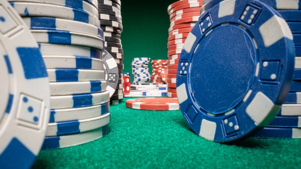Poker gambling table with cards and chips. Poker game